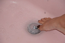 Flip It in action use a finger or toe to open or close your tub or shower drain
